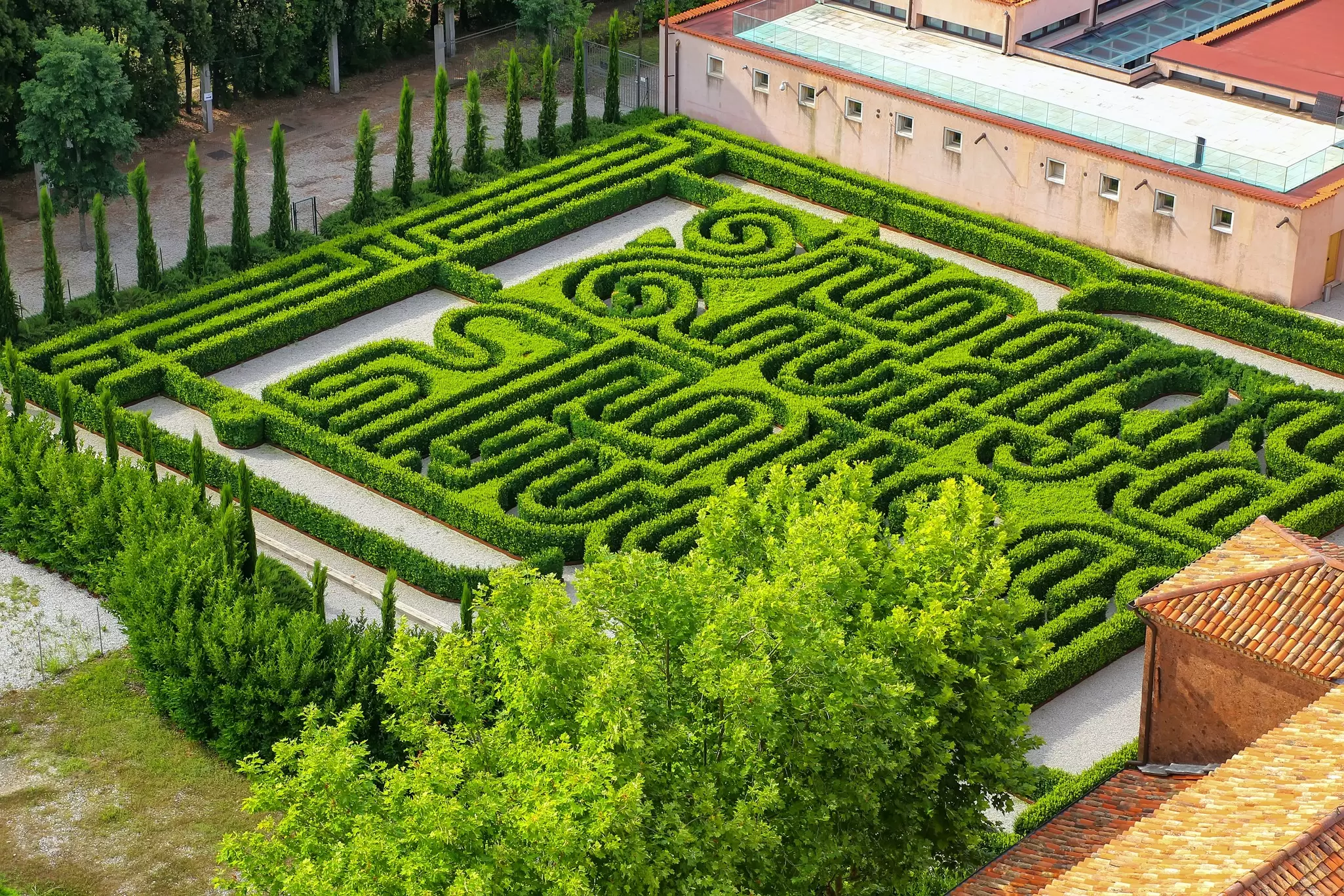 View of the garden in the courtyard of the San Giorgio Monastery on the island of San Giorgio Maggiore in Venice, Italy.