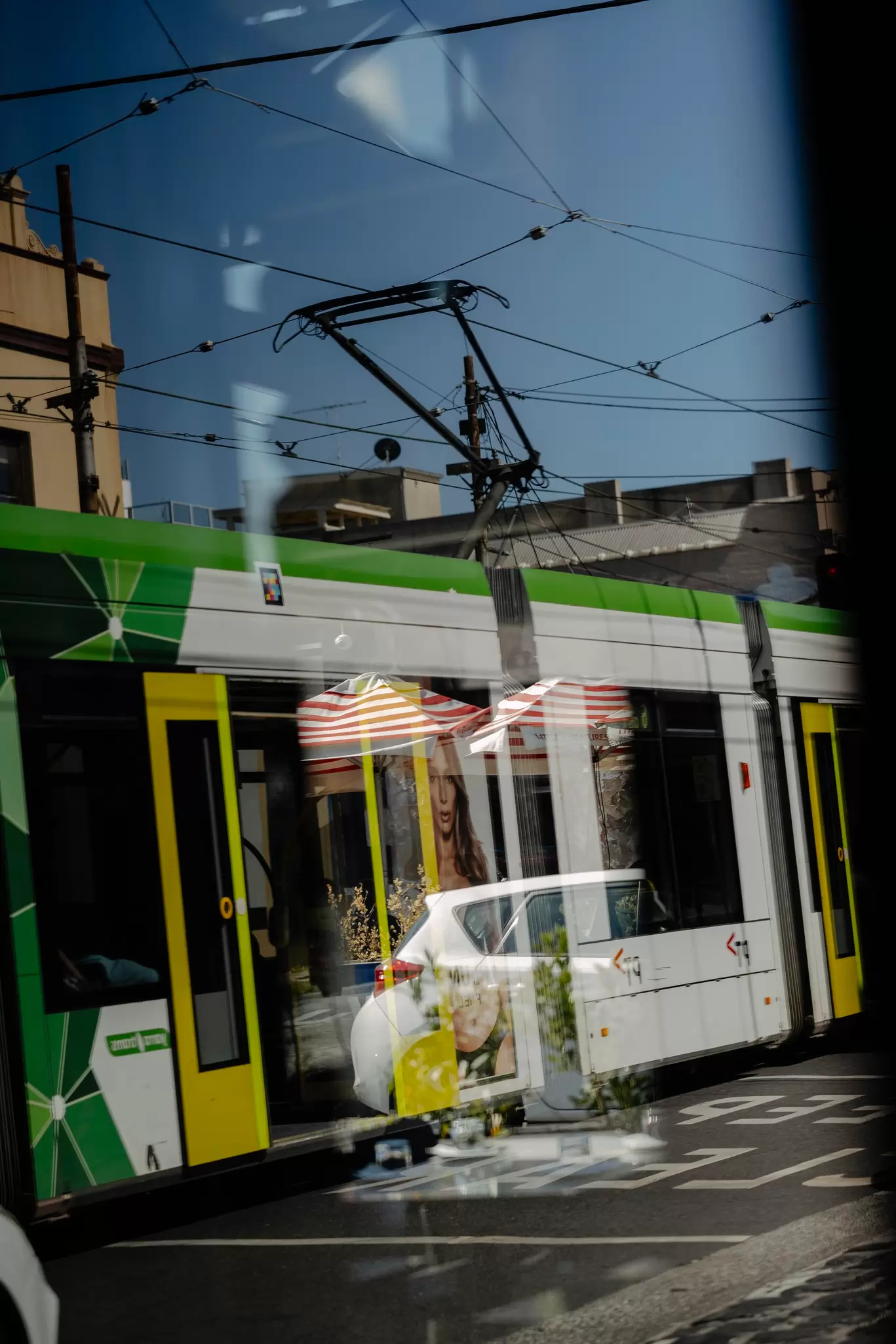 Street scene with a tram (streetcar), Brunswick, Melbourne