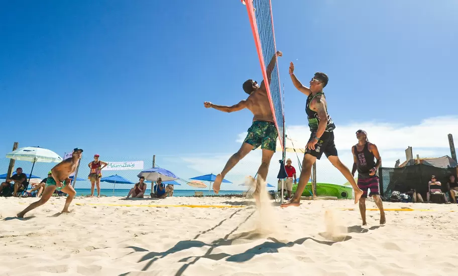 People playing beach volleyball in Playa Del Carmen. 