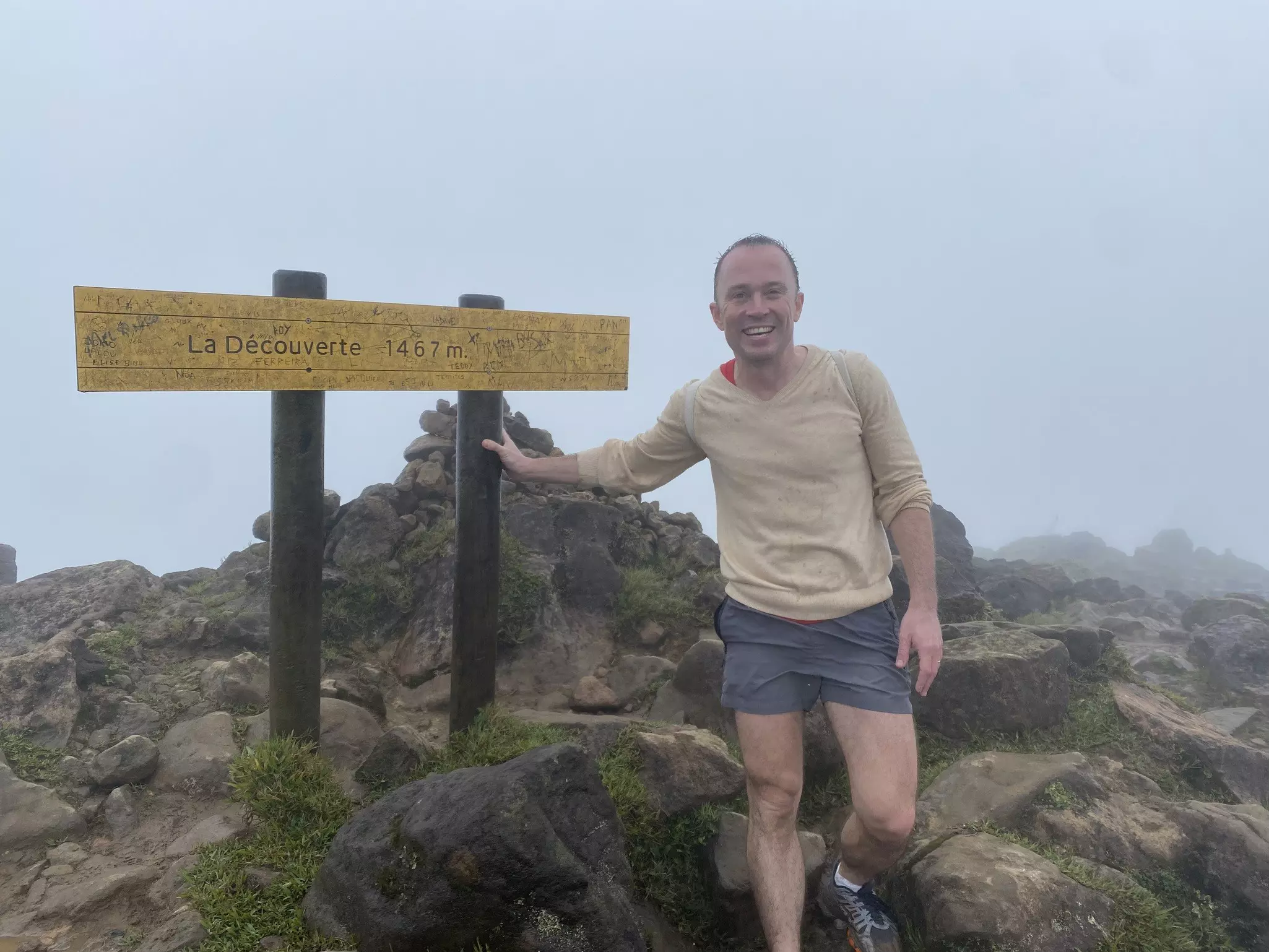  Reaching the summit of La Soufrière, a little wet… © Brian Healy