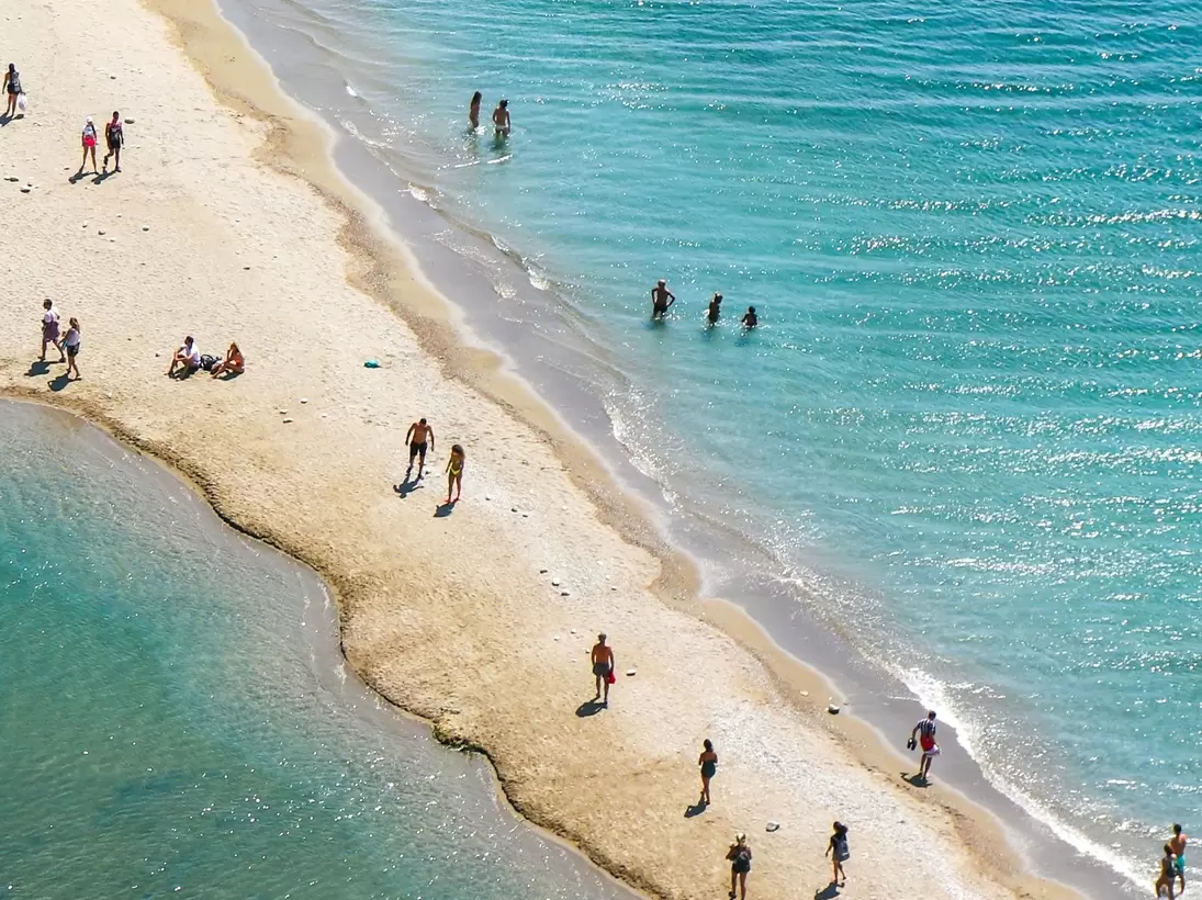 People on the beach of preveli , License Type: media, Download Time: 2025-07-14T16:35:55.000Z, User: katelyn.perry_lonelyplanet, Editorial: false, purchase_order: 65050 - Digital Destinations and Articles, job: WIP, client: App, other: Katelyn Perry