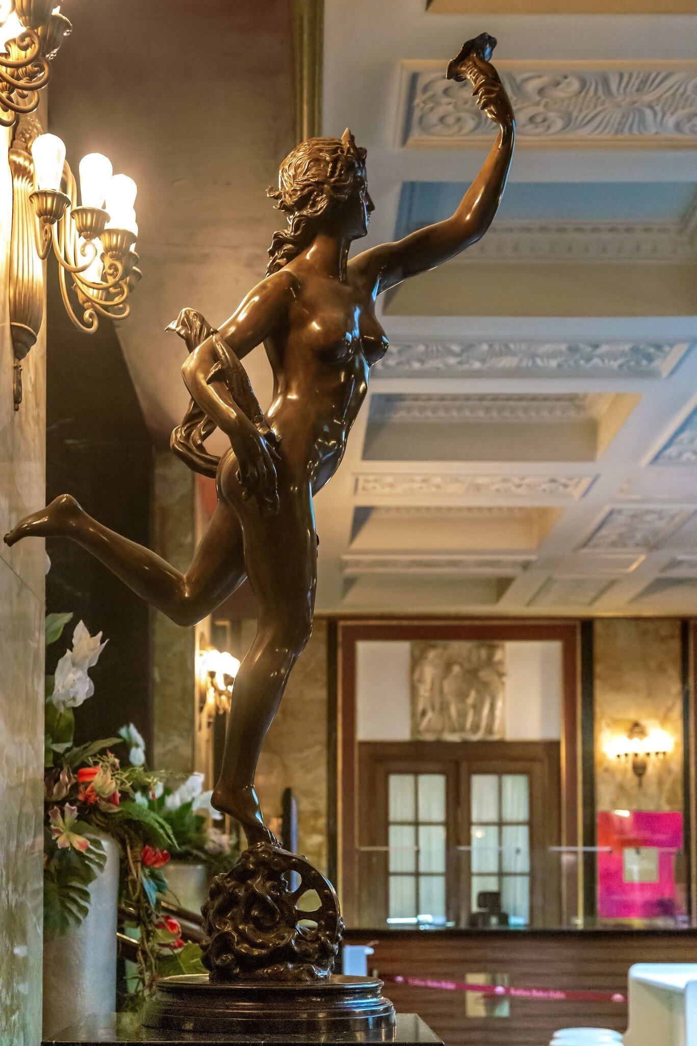 Detail of a sculpture of Fortuna with the Horn of Plenty in the interior of the Kurhaus hall, Baden-Baden, Germany.