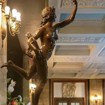 Detail of a sculpture of Fortuna with the Horn of Plenty in the interior of the Kurhaus hall, Baden-Baden, Germany.