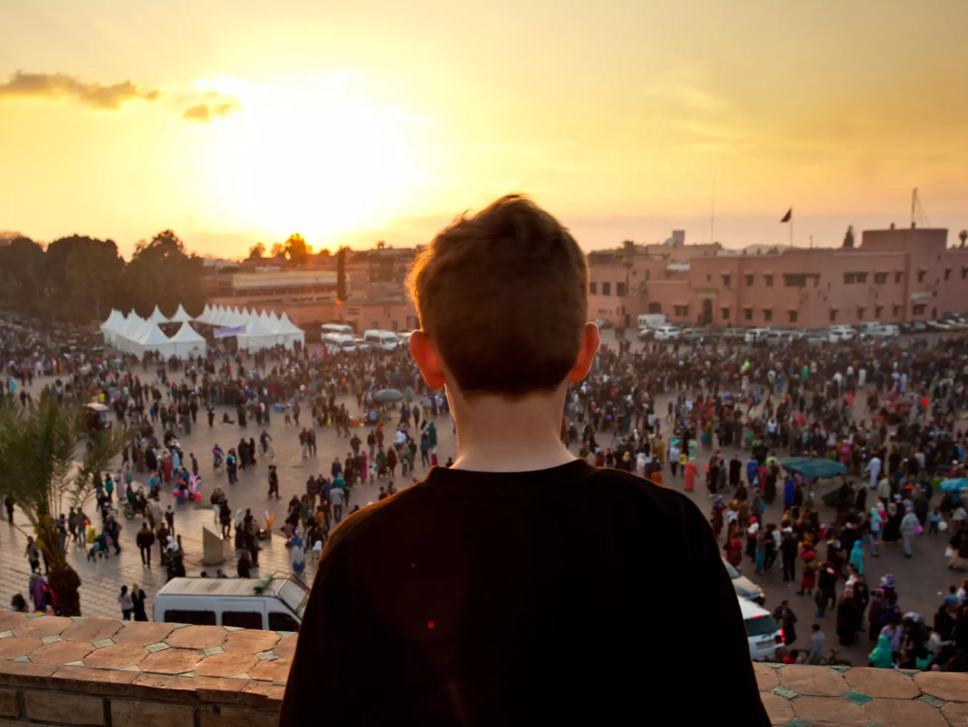 567350311
2015; Africa; Architecture; Photography; Rear View; Crowd; Djemma El Fna Square; Dusk; Large Group Of People; Males; Outdoors; People; Built Structure; Child; Children Only; High Angle View; Marrakesh; Marrakesh-Tensift-El Haouz; Morocco; Mosque; Travel Destinations; City Life; Color Image; Horizontal; Incidental People; One Boy Only; One Person; Standing; Sunset;
Boy looking out onto Jemaa el Fna square in Marrakech, Morocco at sunset.