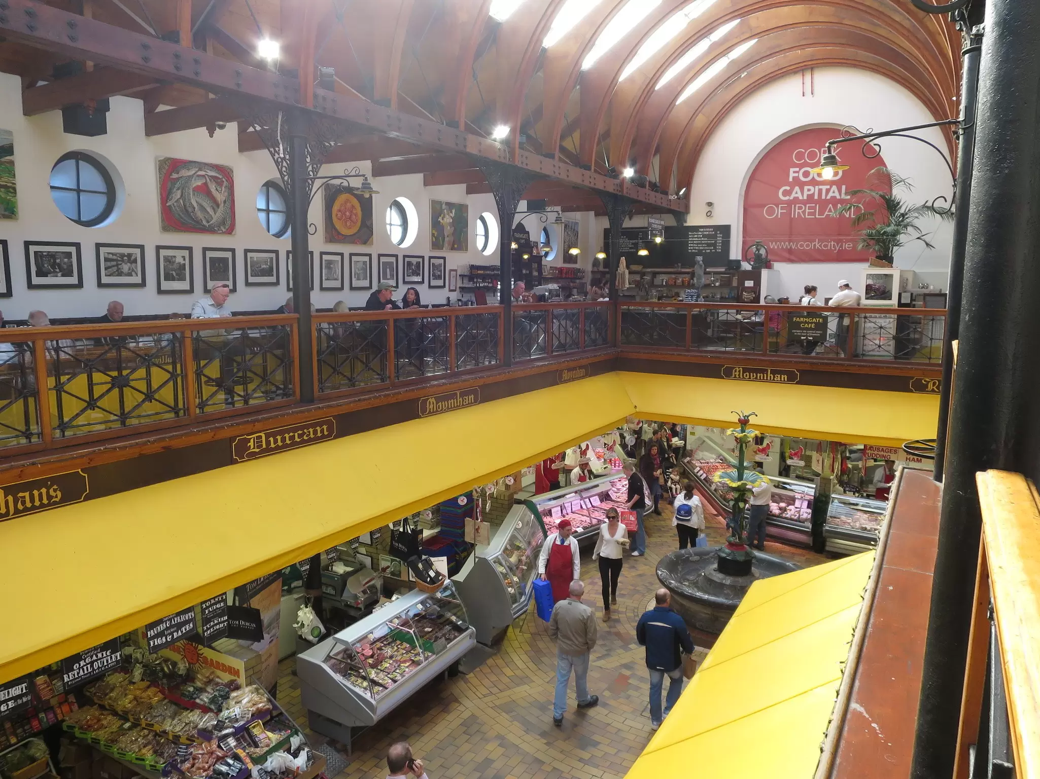 Aerial view of people walking around at Cork's English Market.