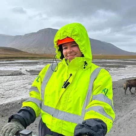 Chamidae Ford dog sledding on an overcast day.