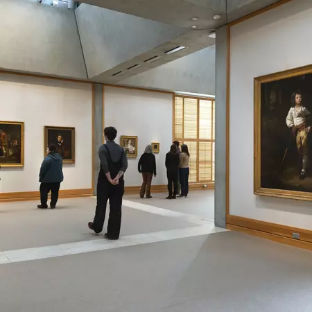 People look at paintings in the newly installed Long Gallery at the Yale Center for British Art