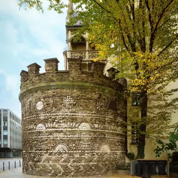 The nearly 2000-year-old Roman Tower (Römerturm) in Cologne, Germany shows its mosaic facade.