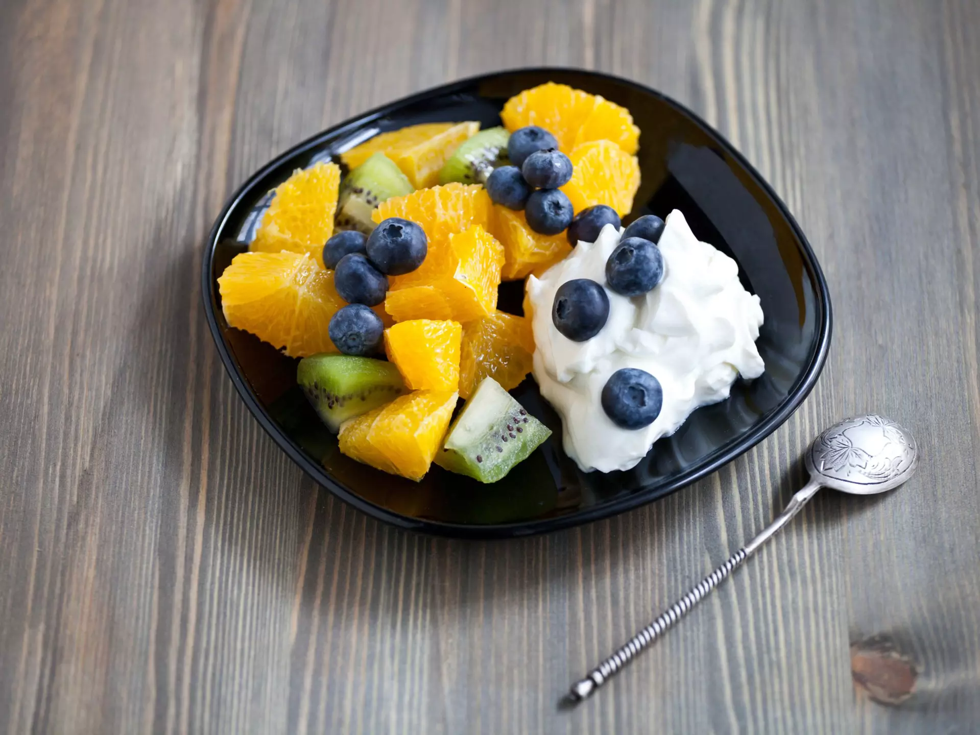 Fresh Icelandic skyr yogurt with berries and fruits on a black plate, License Type: media, Download Time: 2025-11-24T19:05:45.000Z, User: comptonsheldon109, Editorial: false, purchase_order: 56530 - Guidebooks, job: Global Publishing WIP, client: Experience Iceland 2, other: Compton Sheldon