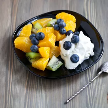 Fresh Icelandic skyr yogurt with berries and fruits on a black plate, License Type: media, Download Time: 2025-11-24T19:05:45.000Z, User: comptonsheldon109, Editorial: false, purchase_order: 56530 - Guidebooks, job: Global Publishing WIP, client: Experience Iceland 2, other: Compton Sheldon