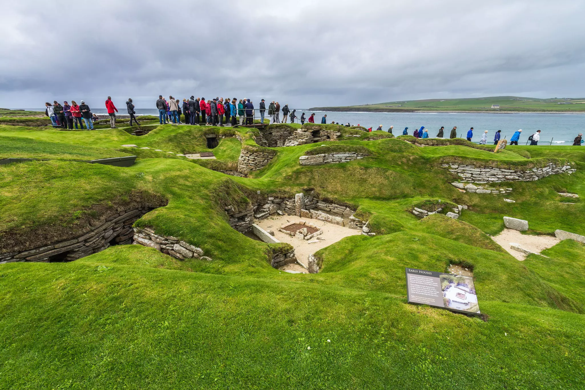 Visitors at Skara Brae, one of the oldest Neolithic settlement in the world.