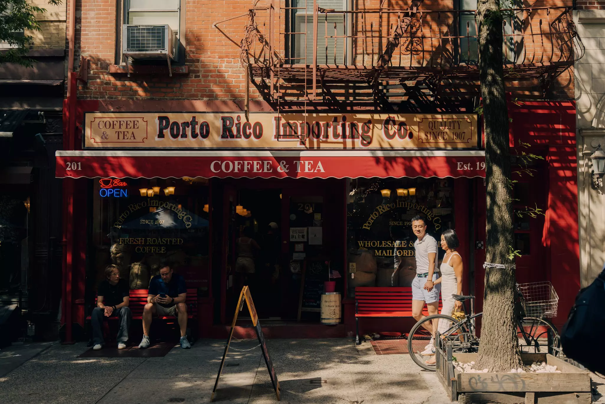 The facade of a coffee shop in New york city. 