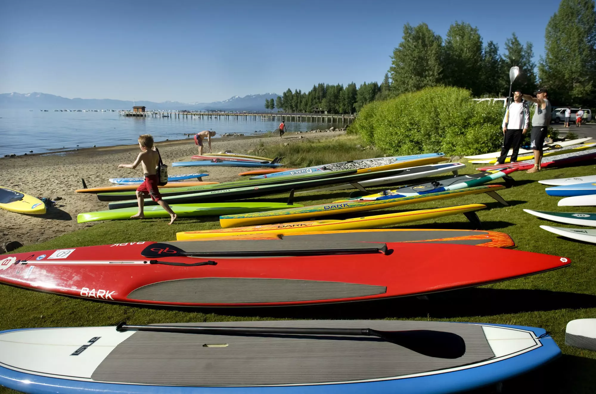 Paddleboarder are readied on Commons Beach in Tahoe City, Calif., before the Lake Tahoe Paddleboard Association's "Jam From the Dam," a 6-mile long race along the north shore of Lake Tahoe.