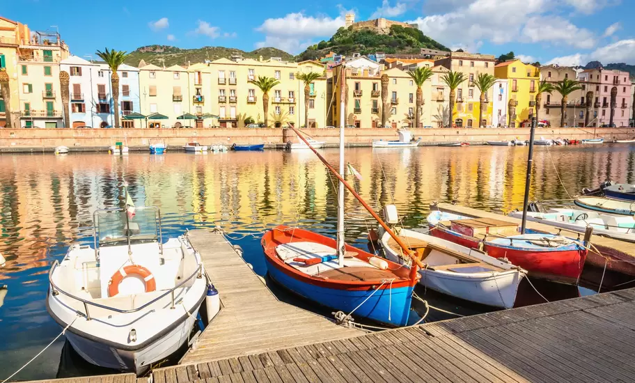 Colourful fishing boats moored on the river at Bosa.
536200936
ancient, antique, architecture, background, boat, bosa, building, castle, characteristic, city, color, colorful, europe, european, famous, history, house, island, italy, jetty, landmark, landscape, mediterranean, old, panorama, panoramic, pier, quay, reflection, river, romantic, sardegna, sardinia, scenery, sky, street, summer, sunset, temo, tourism, town, traditional, travel, urban, view, village, wallpaper, water