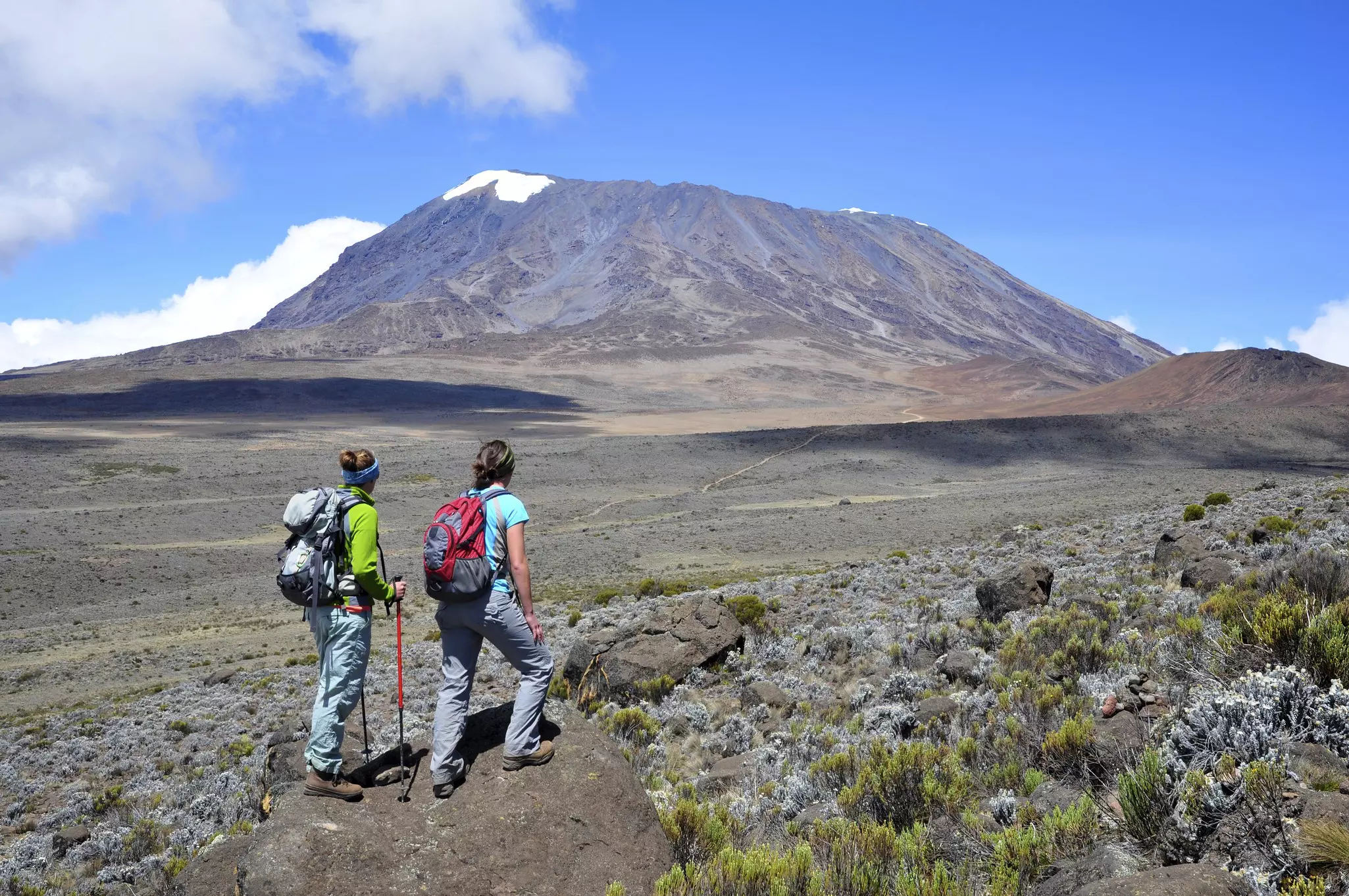 Hiking to the summit of Mt Kilimanjaro is another iconic Tanzania experience © thinair28 / Getty Images