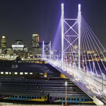 Bright lights, big city: Nelson Mandela Bridge lights up the night in Johannesburg. Henrique NDR Martins / Getty Images