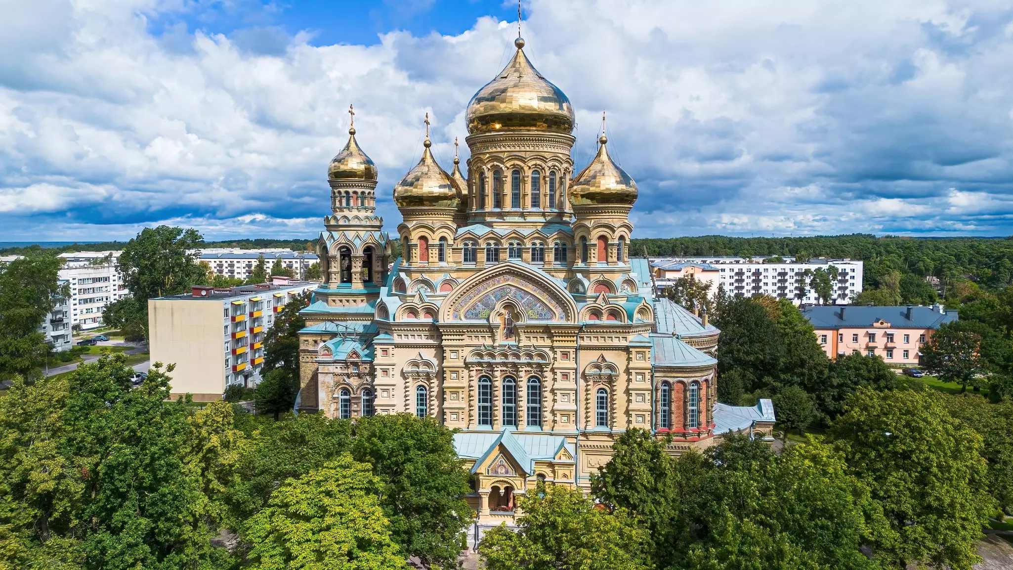 Sunny skies over the golden domes of St Nicholas Naval Cathedral in Karosta, Liepāja, Latvia. 
