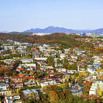 Bukaksan and the leafy Seongbuk-dong neighborhood. Stock for you/Shutterstock