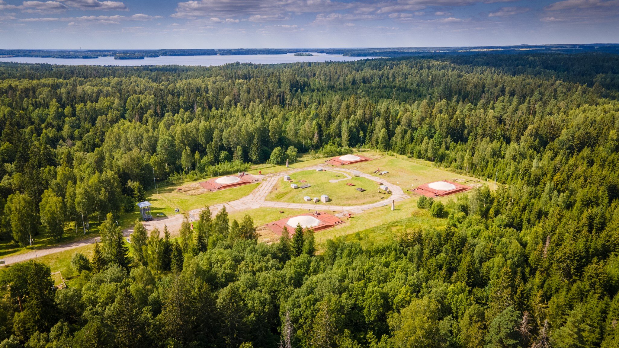 Aerial Cold War museum made in Plosktynes abandoned missile base near Plateliai lake. By drone. Build by Soviet union.; Shutterstock ID 1835836150;