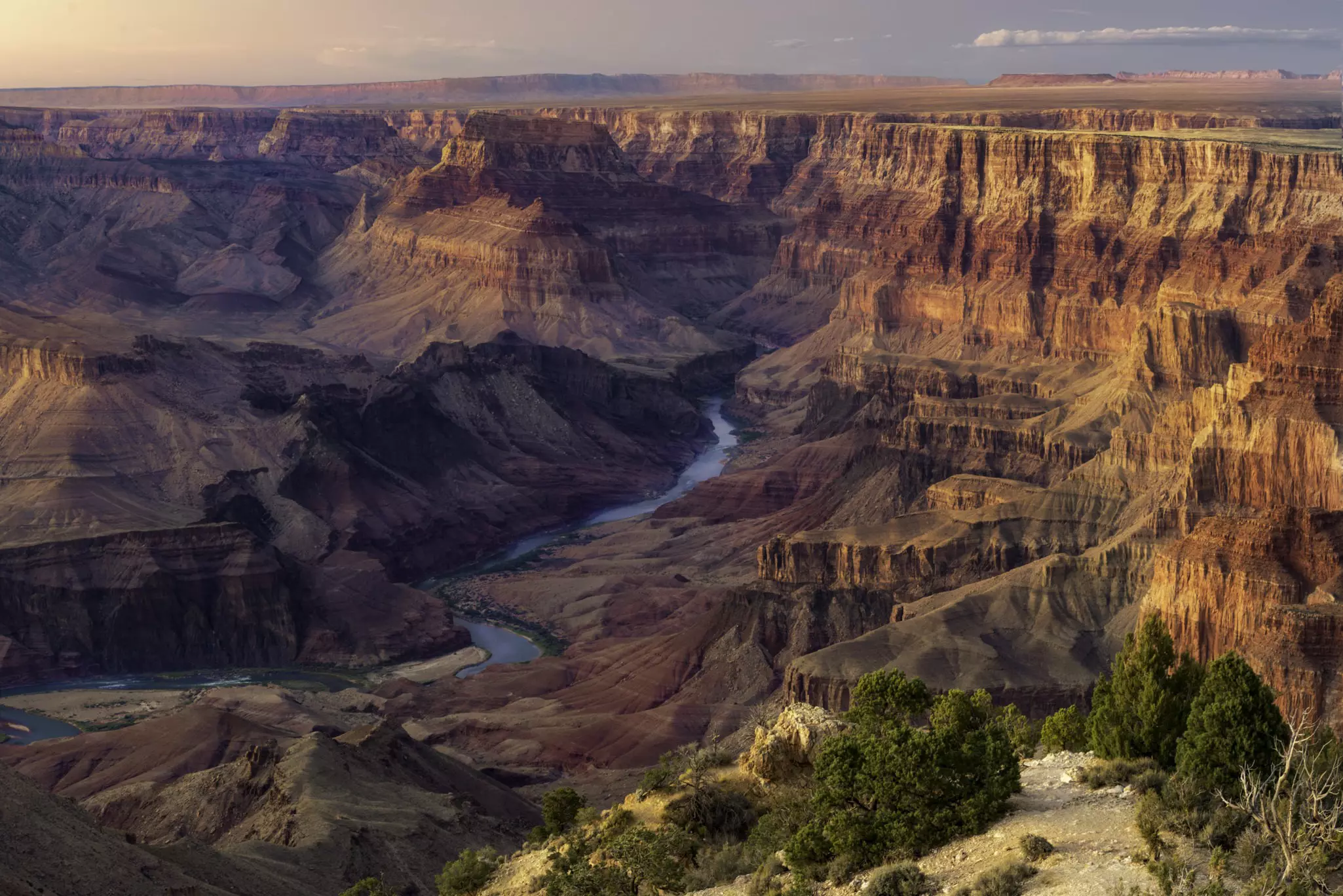 Sunset over the Colorado River deep in the Grand Canyon. Dean Fikar/Getty Images