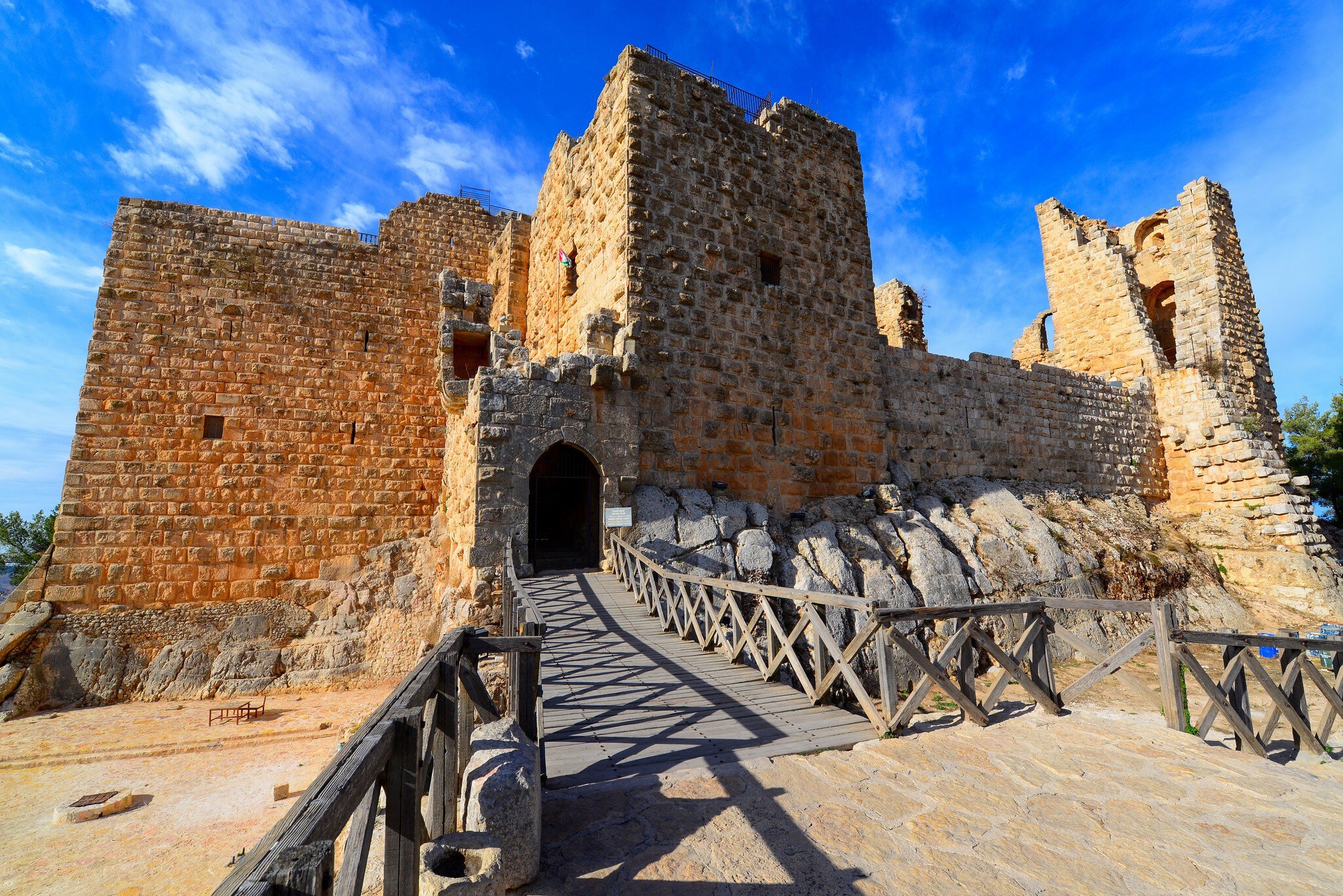 Built on top of the mountain, Ajloun Castle is a fine example of Islamic military architecture, marking it an important strategic link in the defensive chain against the Crusaders.; Shutterstock ID 2107312184;