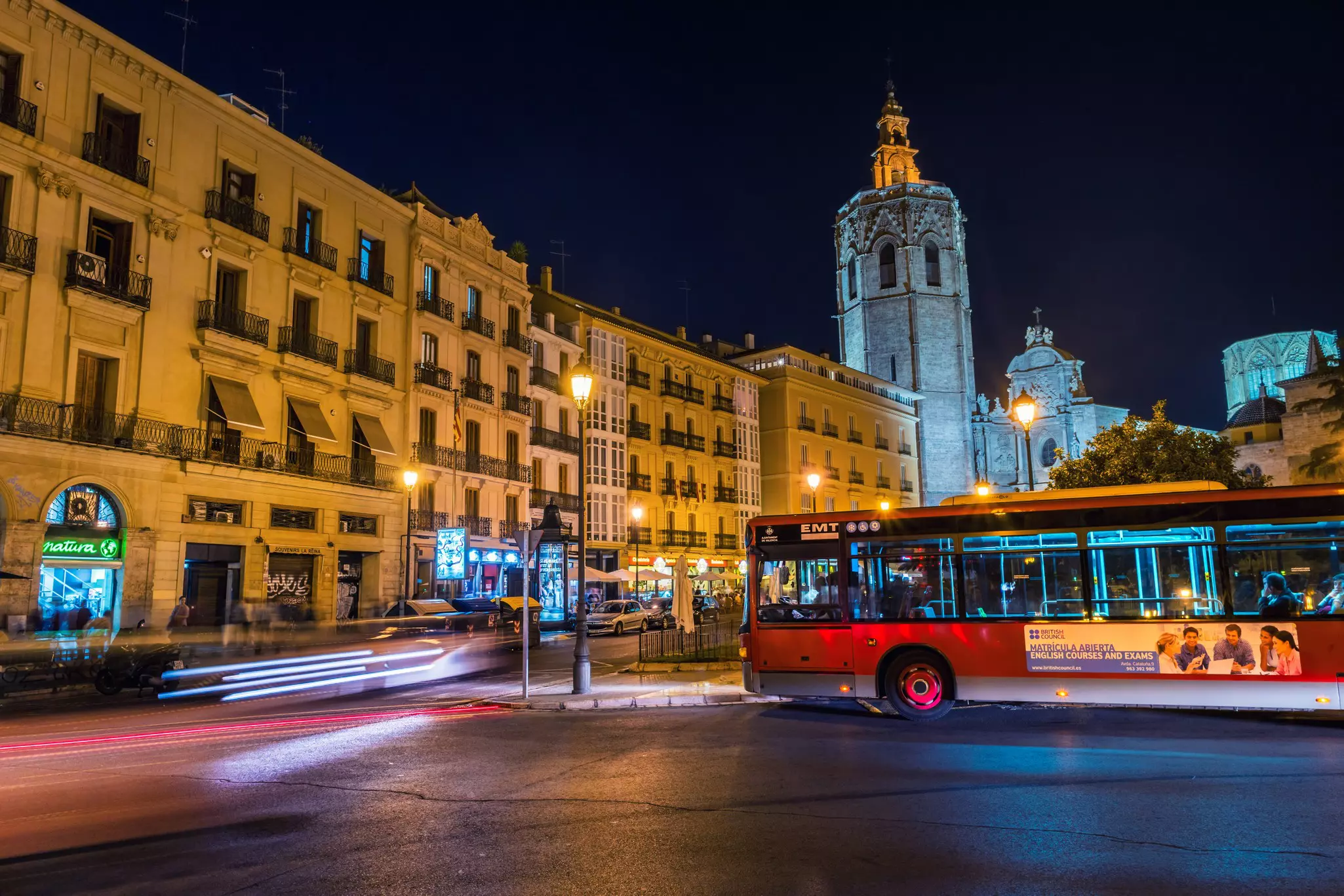 VALENCIA, SPAIN - OCTOBER 10, 2015: Illuminated historical buildings at the Reina square.