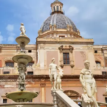 The Pretoria Fountain surrounded by nude sculptures in Palermo.