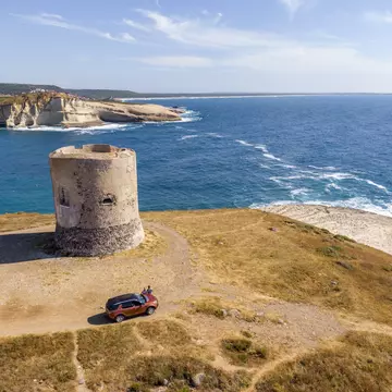 Having your own set of wheels in Sardinia gives you plenty of freedom, but make sure you know the rules of the road © SimonSkafar / Getty Images