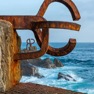 View of the Peine del Viento (Wind Comb) sculpture by the sea in San Sebastián, Spain.