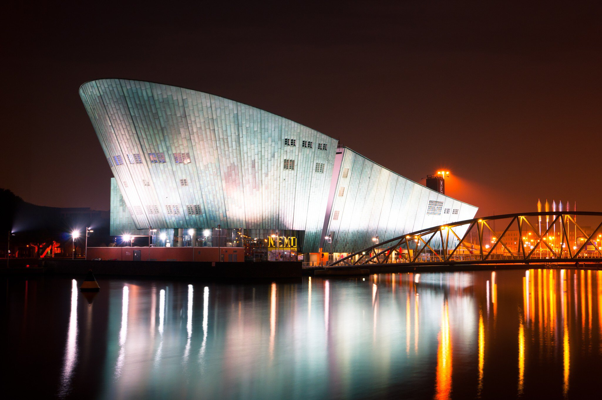 AMSTERDAM, NETHERLANDS - JULY 27: The Nemo Museum at night on July 27, 2013 in Amsterdam, Netherlands. Science Center NEMO is designed by Renzo Piano since 1997.; Shutterstock ID 162619127; Your name (First / Last): Josh Vogel; Project no. or GL c...