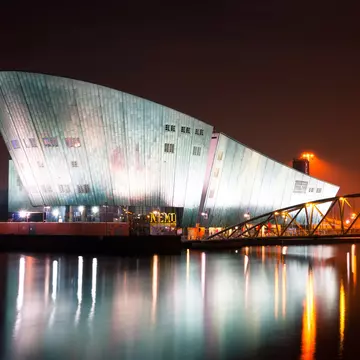 AMSTERDAM, NETHERLANDS - JULY 27: The Nemo Museum at night on July 27, 2013 in Amsterdam, Netherlands. Science Center NEMO is designed by Renzo Piano since 1997.; Shutterstock ID 162619127; Your name (First / Last): Josh Vogel; Project no. or GL c...