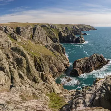 The wild cliffs of Lundy, where puffins can be found nesting. Hanneke Luijting / Getty Images