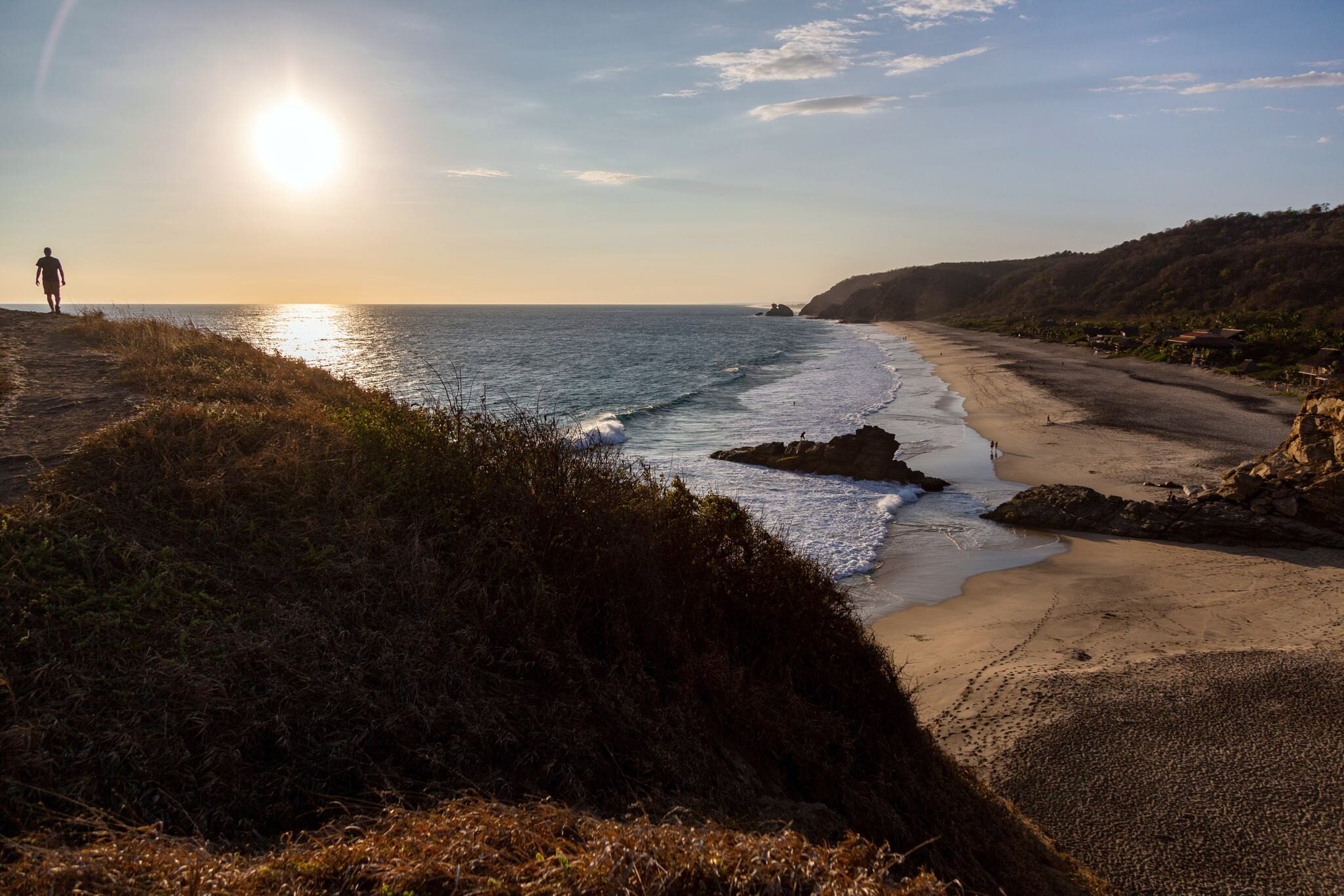 Amazing sunset over the pacific ocean from a hill in Punta Cometa, Mazunte, Mexico