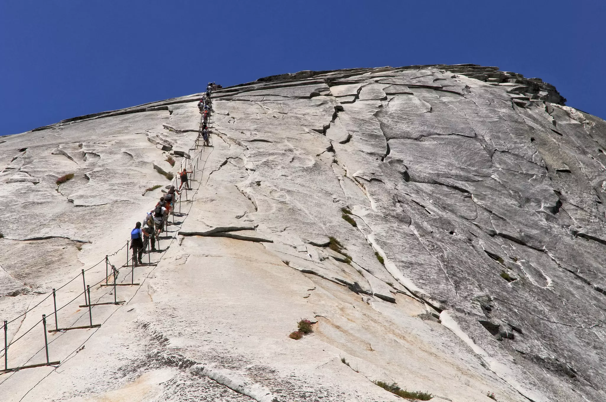 Hikers on stark mountain