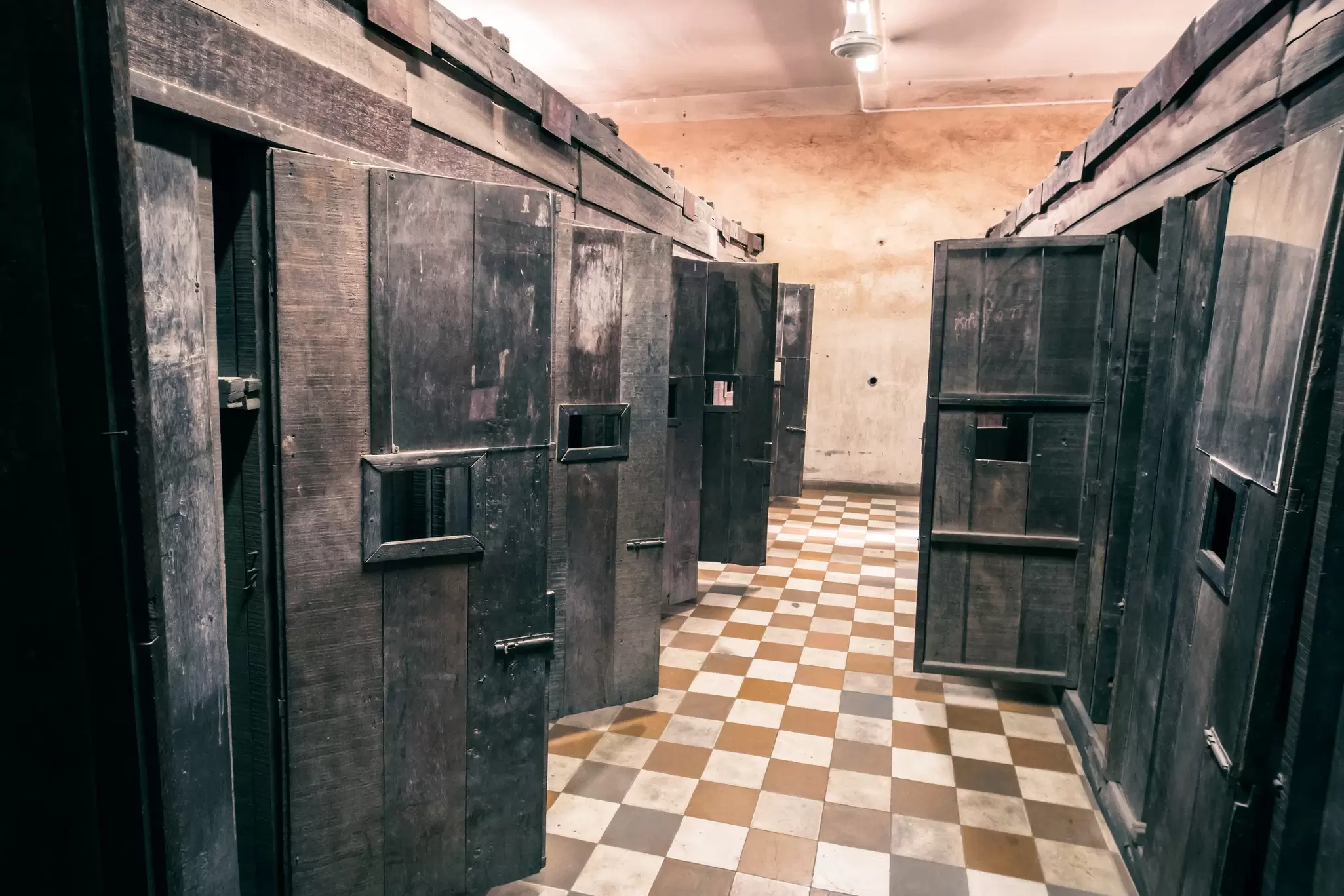 The doors of prison cells at the Tuol Sleng Genocide Museum in Phnom Penh, Cambodia.