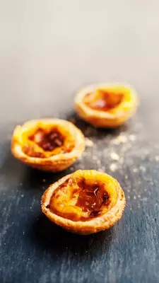 Three traditional Portuguese custard tarts