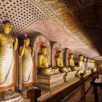 Interior of a sacred Buddhist shrine in the Dambulla Cave Temples, Sri Lanka.