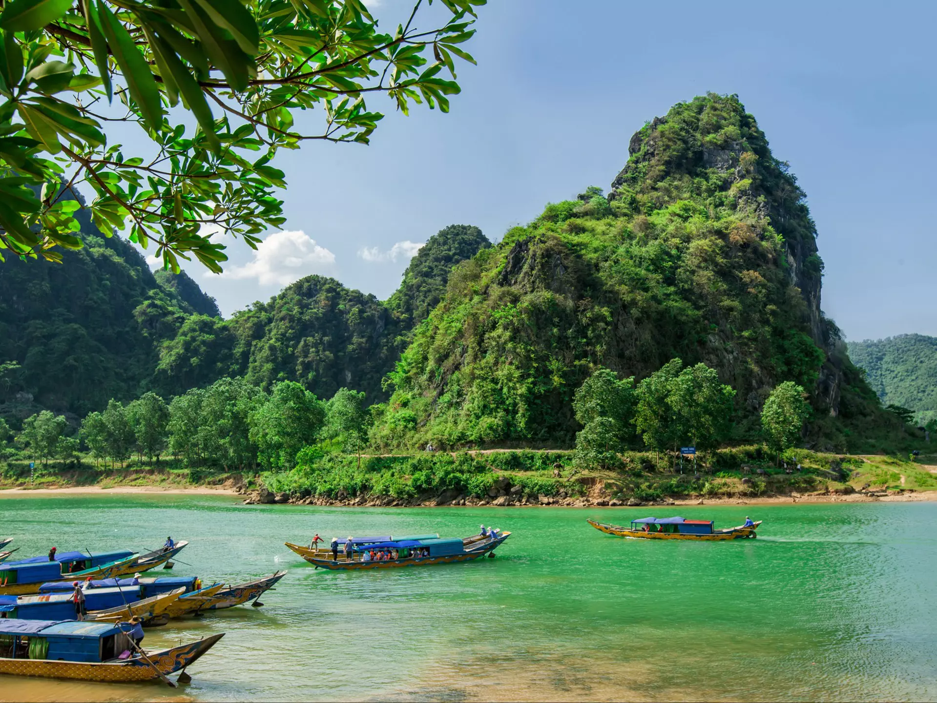 Boats on the river at Phong Nha-Ke National Park. Jethuynh / Getty Images