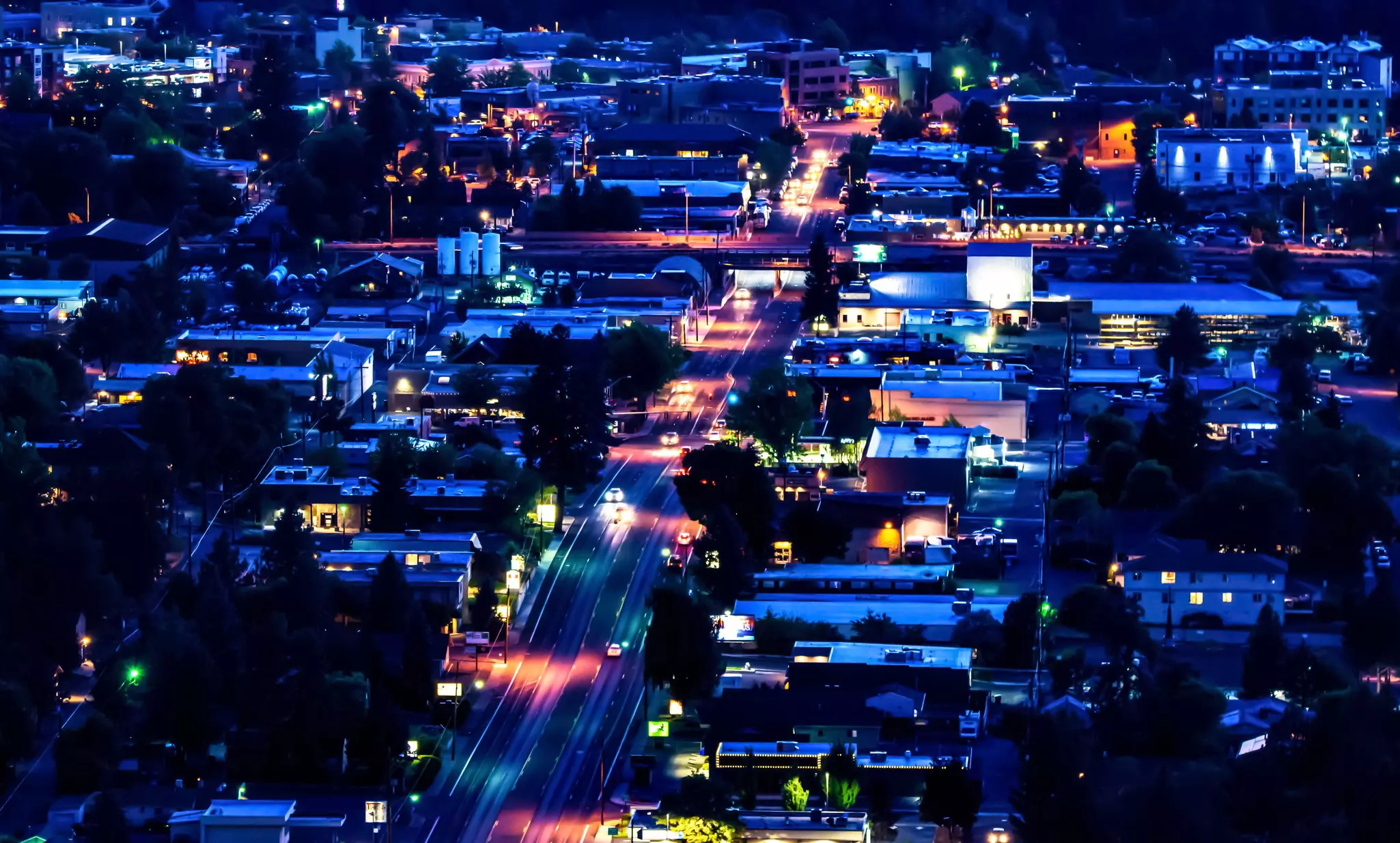 Close-up shot of Hwy 20 in Bend, Oregon by night, shot from the top of Pilot Butte Parl