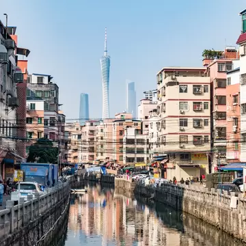 View of buildings by a canal in Dai Tang village, Guangzhou, China.