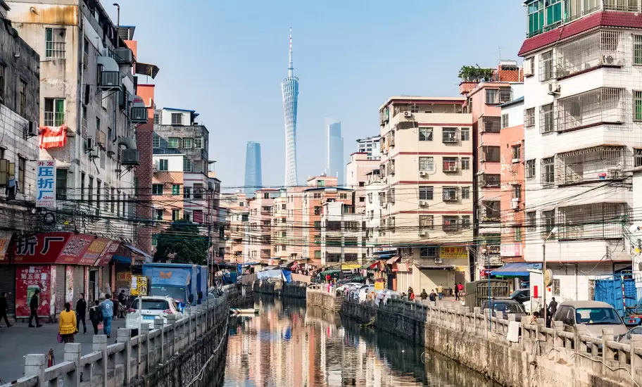 View of buildings by a canal in Dai Tang village, Guangzhou, China.