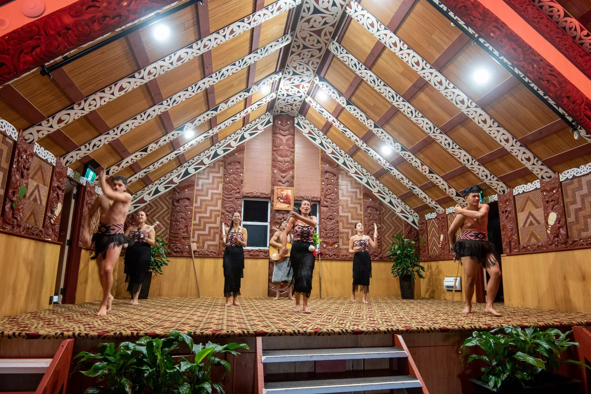 Traditional Māori dance in a touristic Te Puia cultural center in Rotorua