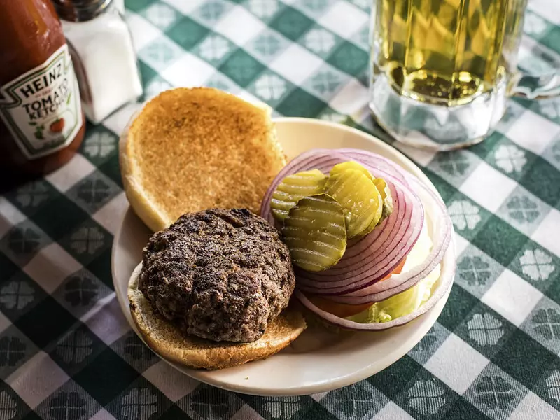A burger is displayed for a photograph at J.G. Melon restaurant in New York, U.S