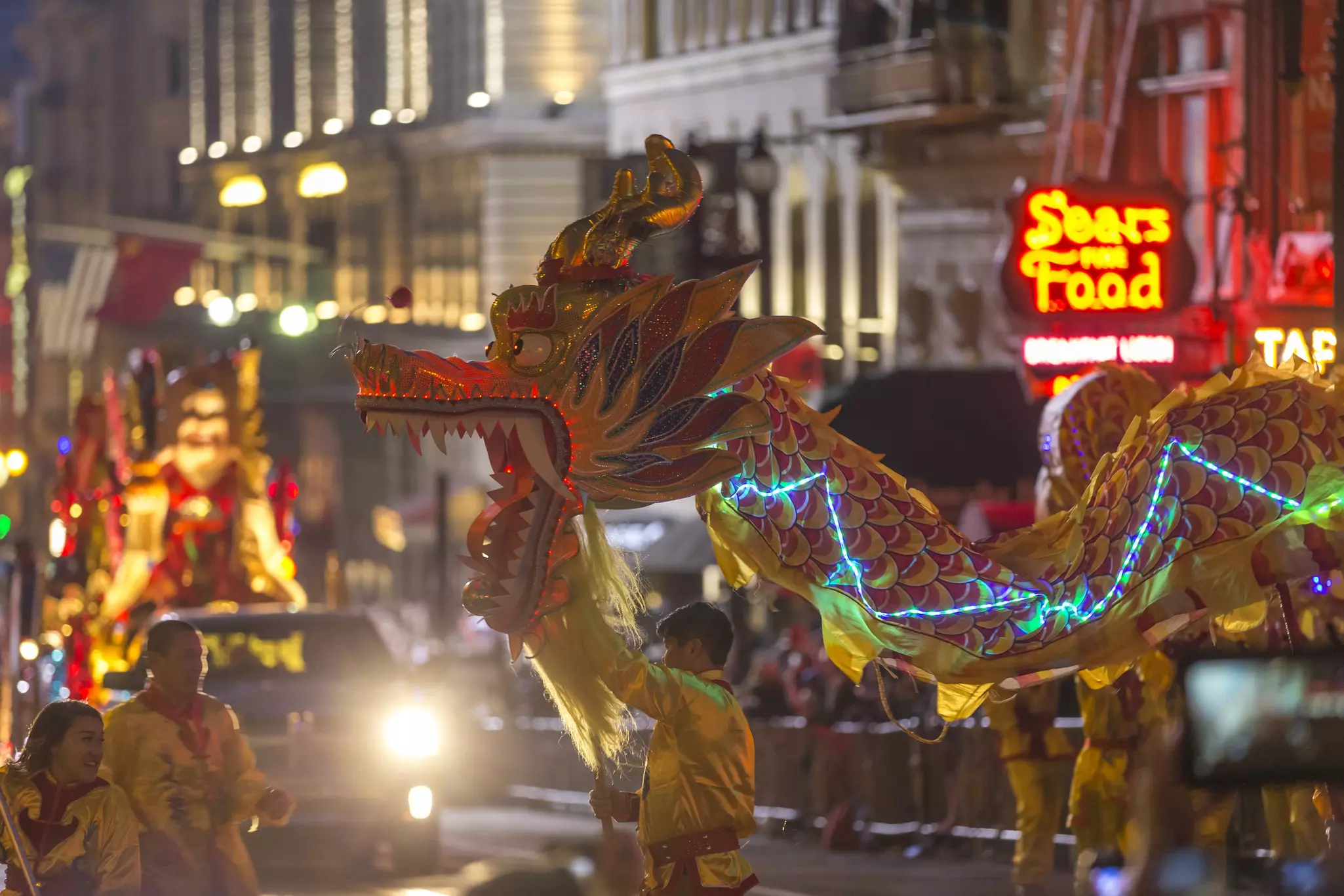 An illuminated dragon weaves through the streets of San Francisco during the city's Lunar New Year celebrations. Spondylolithesis/Getty Images