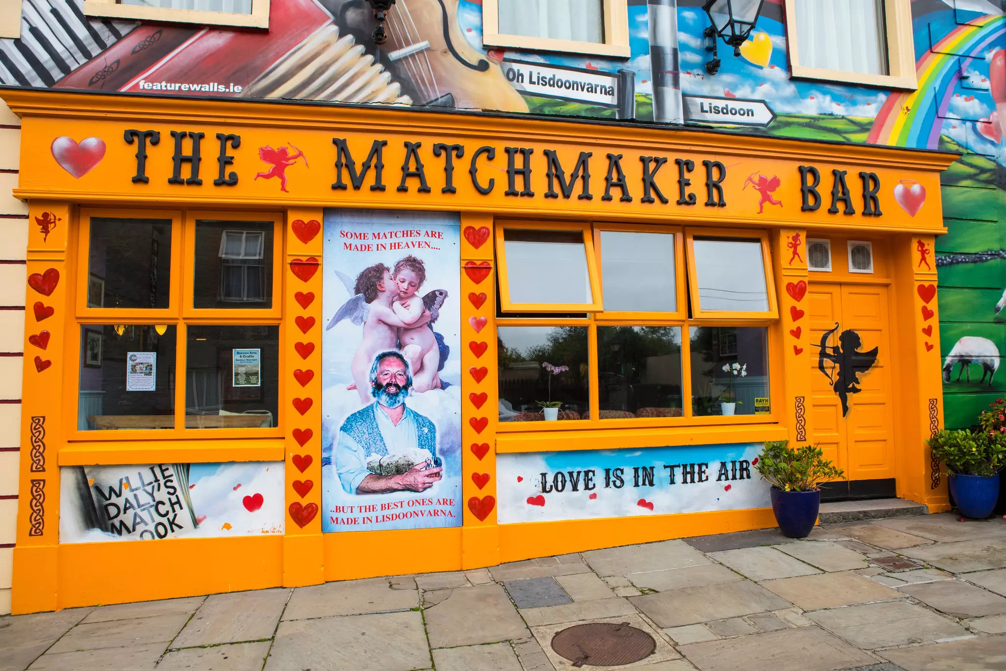The yellow exterior of the Matchmaker Bar in the town of Lisdoonvarna