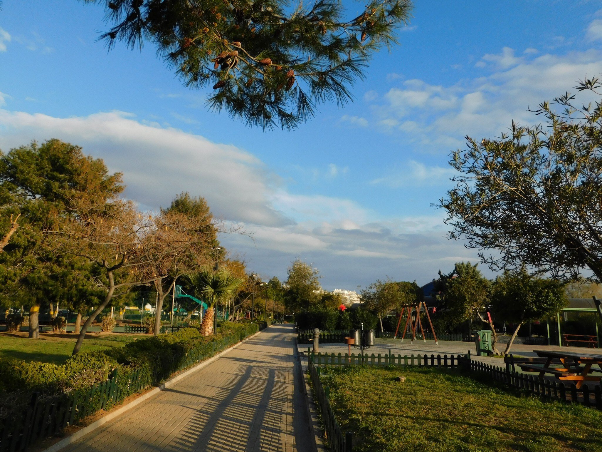 View of a path winding through Flisvos Park in Athens, Greece.