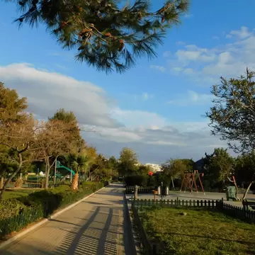View of a path winding through Flisvos Park in Athens, Greece.