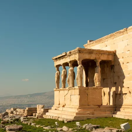 Greek ruins overlooking a field