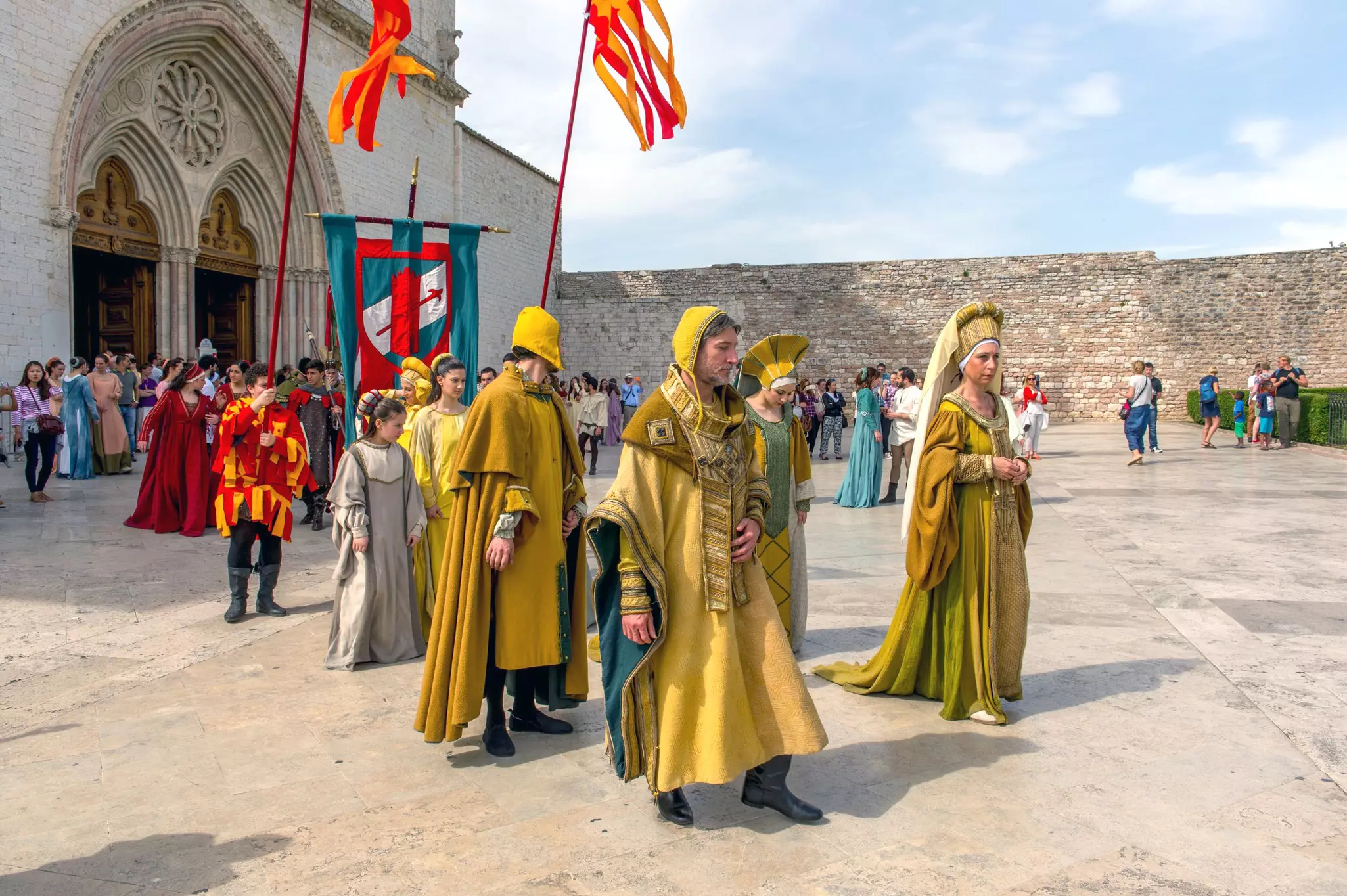 People in medieval costumes in a procession for the Feast of Calendimaggio festival the beginning of May in the historic town of Assisi © Wolfgang Kaehler / Getty Images
