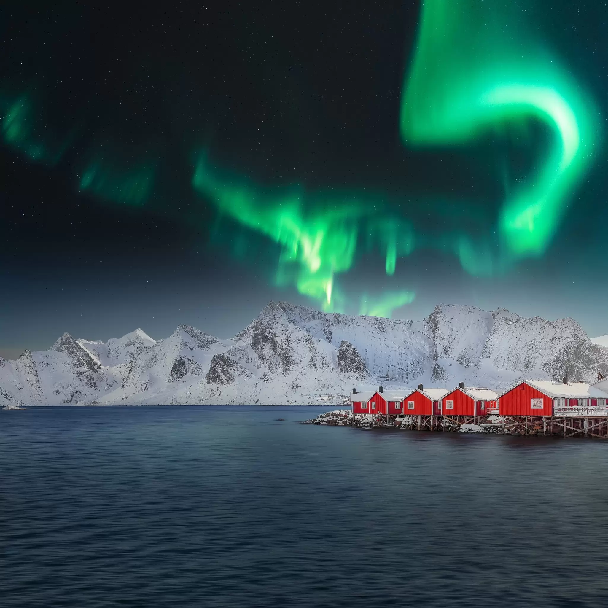 Winter view on Hamnoy village with Northern Lights. (Aurora Borealis).  Location: Hamnoy,  Moskenesoya , Lofoten; Norway, Europe